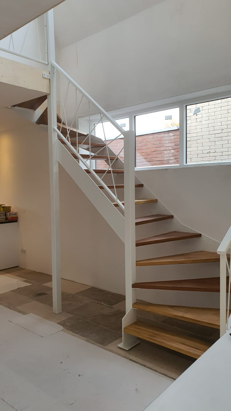 Kwartslagtrappen met striptrapbomen